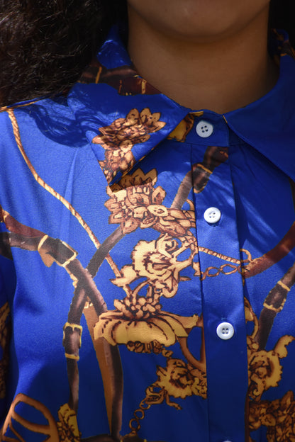 Vestido azul con estampado dorado