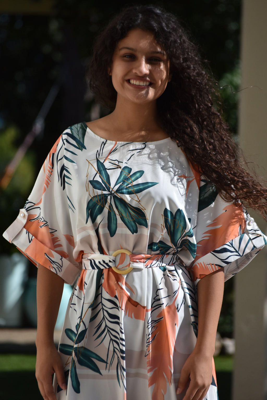 Vestido de flores naranjas con verde